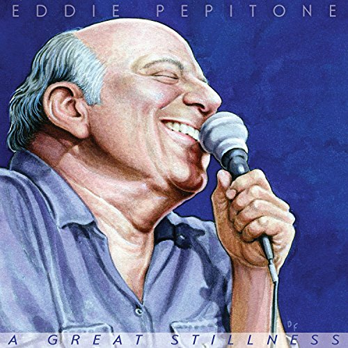 Album cover featuring a man singing into a microphone, with blue background.