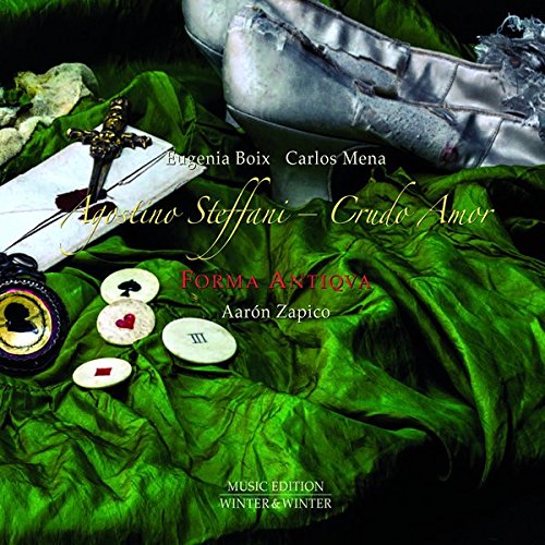 "CD cover with green fabric, sword, playing cards, and silver shoe."