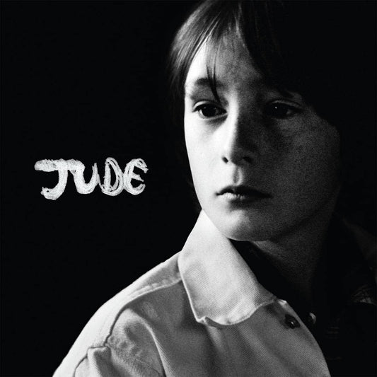 Black and white album cover featuring a young boy with the word "JUDE" written beside him.