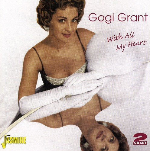 Album cover featuring a woman in a black dress holding a pillow, with "Gogi Grant" text.