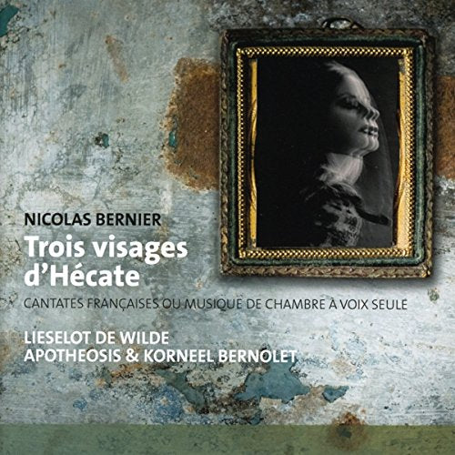"CD cover with a framed black and white portrait on a distressed background."