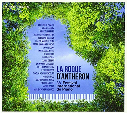 "CD cover featuring a blue sky with trees and piano keys."