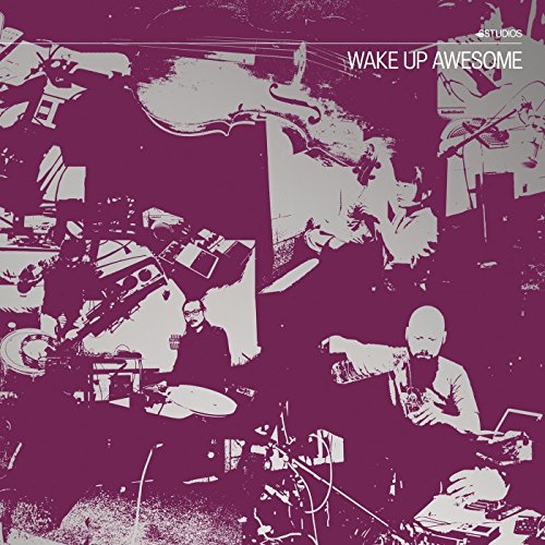 The image is a purple-toned album cover featuring two musicians playing instruments. For accessibility purposes, a suitable alt text could be: "Purple album cover with two musicians playing instruments."
