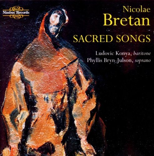 "CD cover featuring a monk in orange robes against a dark background."
