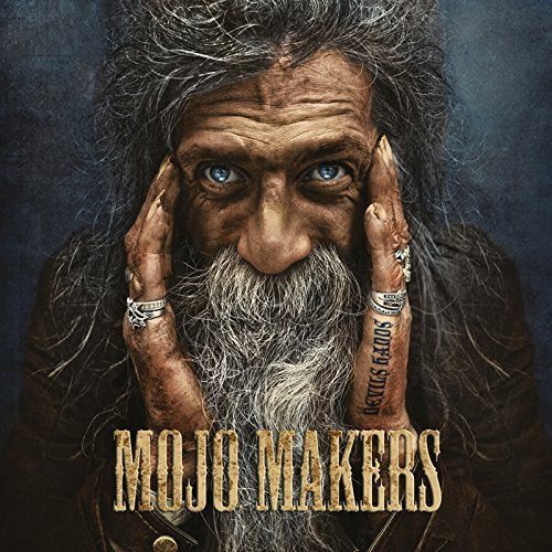 "Album cover featuring a man with long hair and beard, hands on his face."