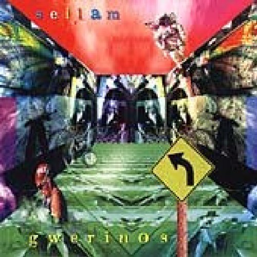 "Album cover with surreal, mirrored images and a diver and astronaut."