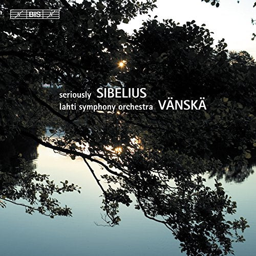 "CD cover with serene lake scene, trees, and white text."