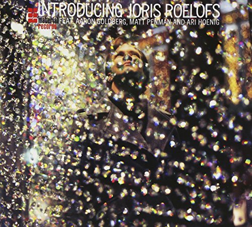 Album cover with a man surrounded by sparkling lights and text "Introducing Joris Roelofs".