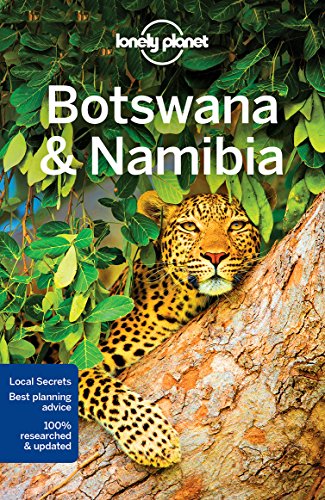 "Travel guide cover featuring a leopard resting on a tree trunk surrounded by foliage."