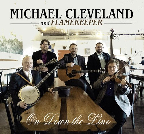 "Album cover featuring five men in suits holding string instruments around a wooden table."