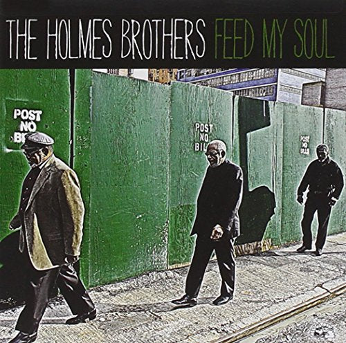 "Album cover: three men walking past green wall with 'post no bills' sign."