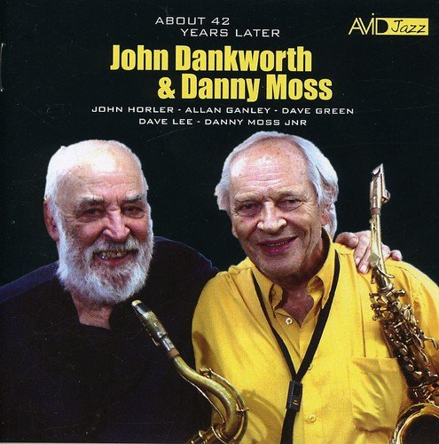 "Album cover featuring two older men holding saxophones, smiling, against a dark background."