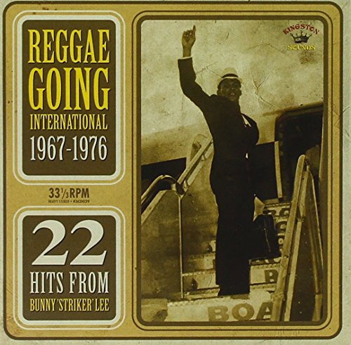 A sepia-toned album cover featuring a man on stairs with raised arm.