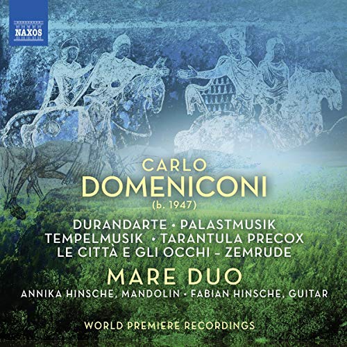 "CD cover with blue-green background, faded carvings, and yellow and white text."