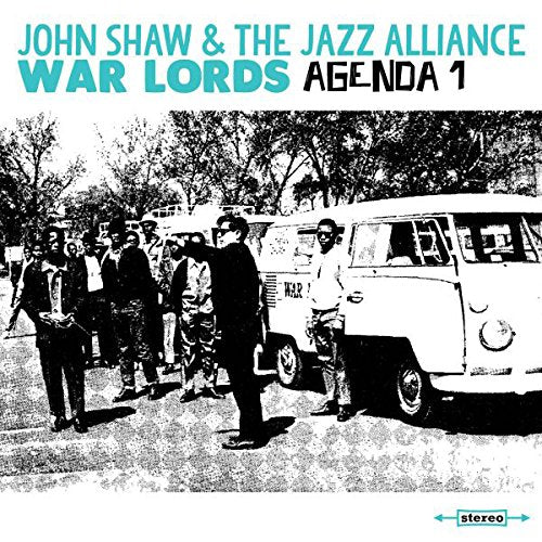 Album cover with black-and-white image of men standing near a van, text at top.