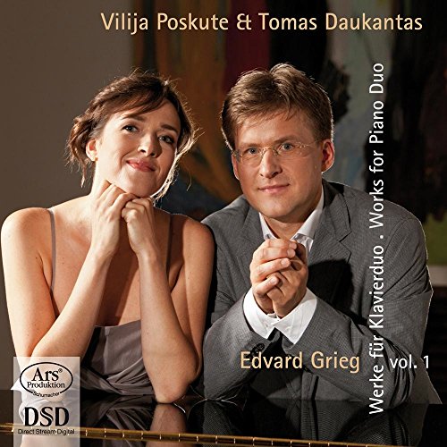 CD cover with a man and woman leaning on a piano.