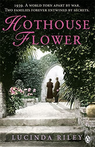 Book cover with a couple standing in a garden archway surrounded by greenery and flowers.