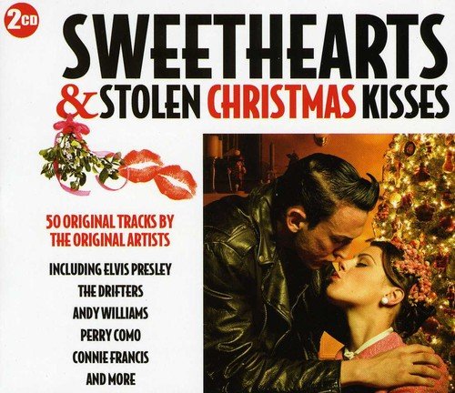 "CD cover with couple kissing under mistletoe, Christmas tree in the background."