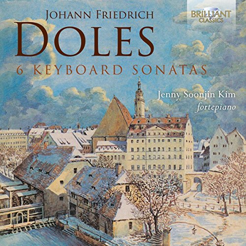 A CD cover featuring a snowy town scene with text overlay.