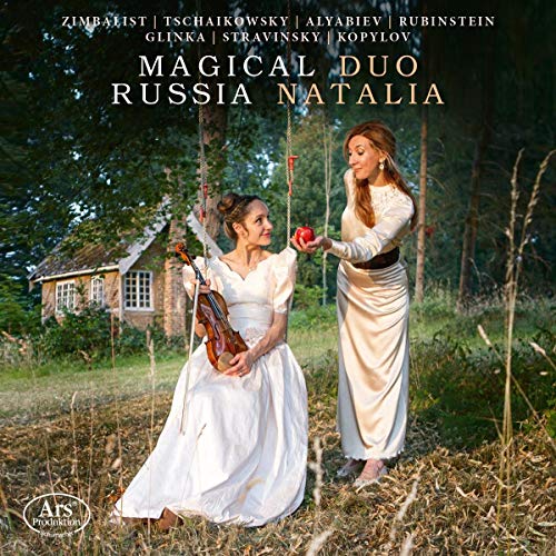 "CD cover featuring two women in white dresses in a forest clearing."