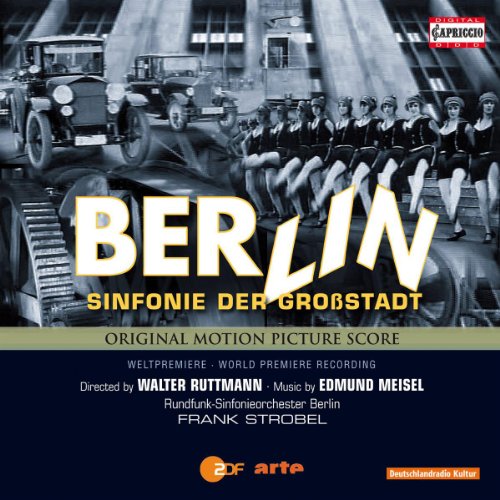 "CD cover with black-and-white image, vintage cars, and marching band, titled 'Berlin'."