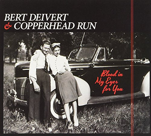 Black-and-white album cover with couple posing by a vintage car, red text on right.