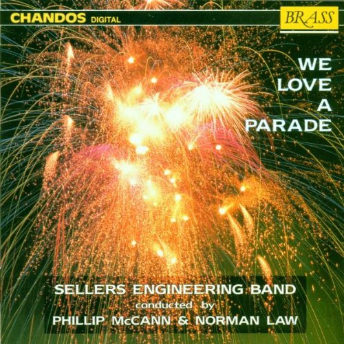 CD cover with fireworks image and white text "We Love a Parade".