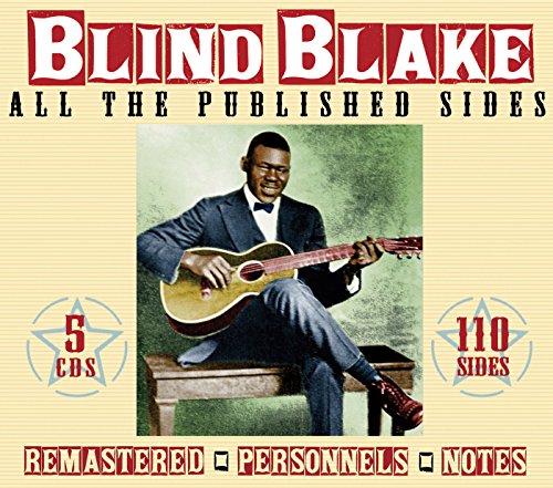 Album cover featuring a man in a suit playing a guitar, on beige background.