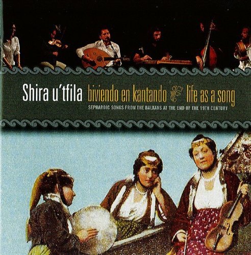"CD cover with musicians and traditional Balkan attire, featuring title and subtitle text."