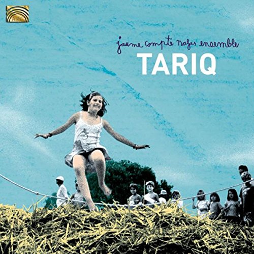 "CD cover with a girl balancing on a rope over hay, people watching below."