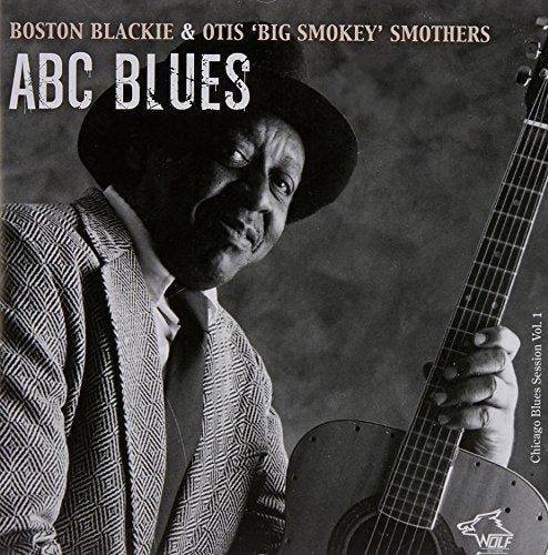 "CD cover with yellow background, featuring two black-and-white musician portraits."
