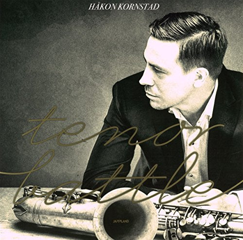 "Album cover with a man holding a saxophone, sepia-toned image, artist's name at top."