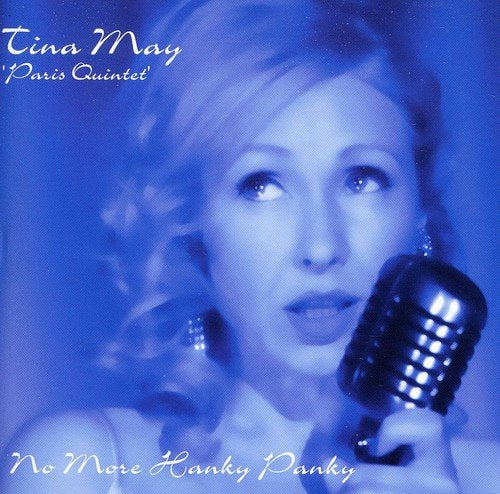"Tina May album cover featuring a woman holding a vintage microphone, blue-toned image."
