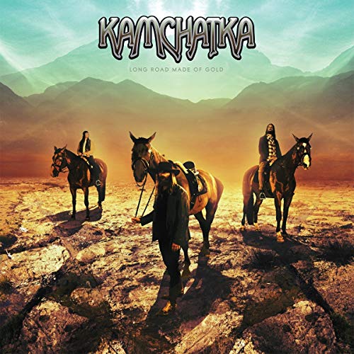 "Album cover art: three horseback riders on rocky terrain, with mountains in the background."