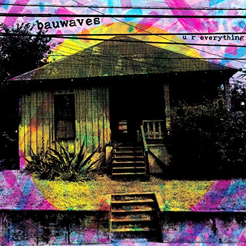 "Vinyl album cover with a house and multicolored abstract background."