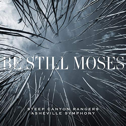 Album cover with "Be Still Moses" text, dark background, and broken glass-like design.
