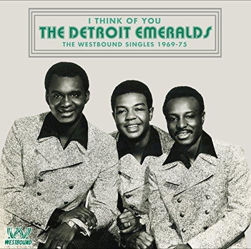"Album cover featuring black-and-white photo of three men in matching speckled jackets."