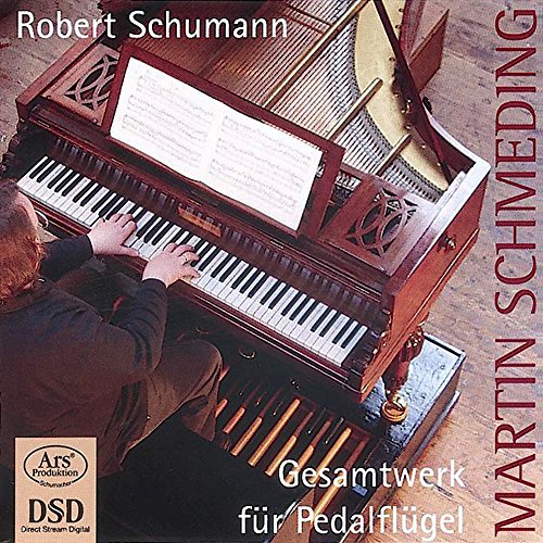 CD cover featuring a man playing a large, ornate pedal piano.