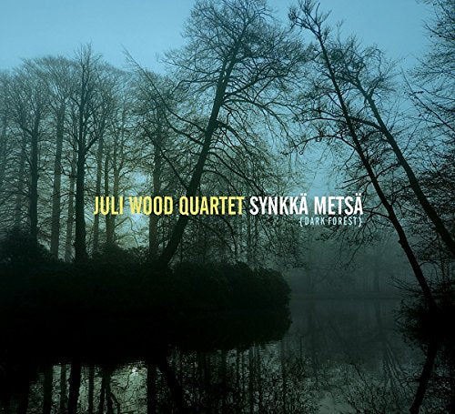 "Album cover featuring a dark, misty forest with bare trees and superimposed text."