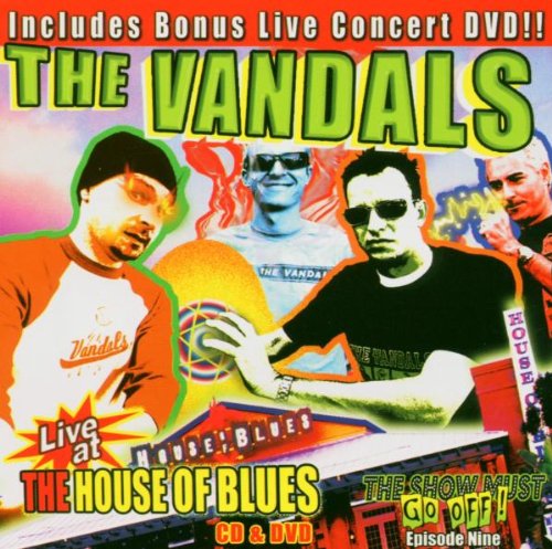 The Vandals' album cover, featuring four band members and a building.