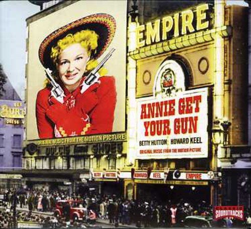 "CD cover featuring a movie poster of a blonde woman holding two guns."