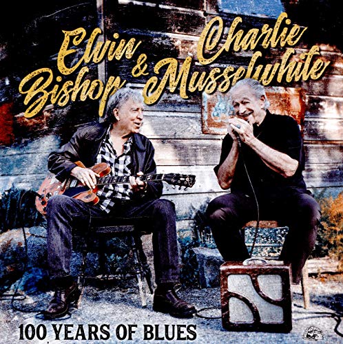 Album cover with two older men sitting on steps, one with guitar, one with microphone.