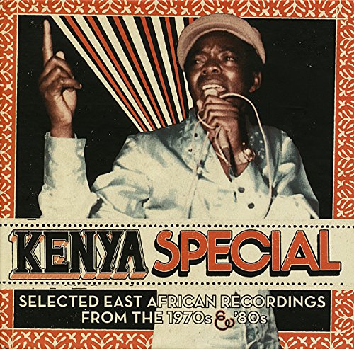 Album cover with man singing into a microphone, orange and white border.