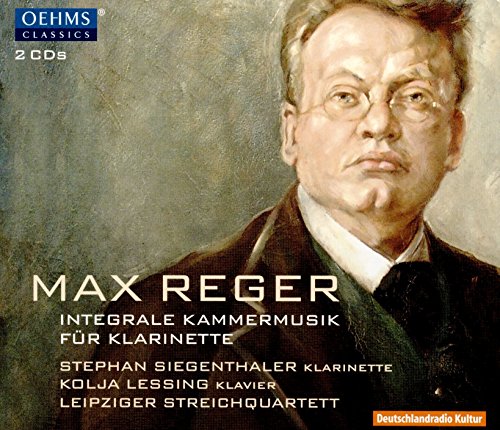 A CD cover featuring a portrait of a man in a dark suit.