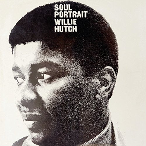 Black and white album cover with a close-up of a man's face and text.