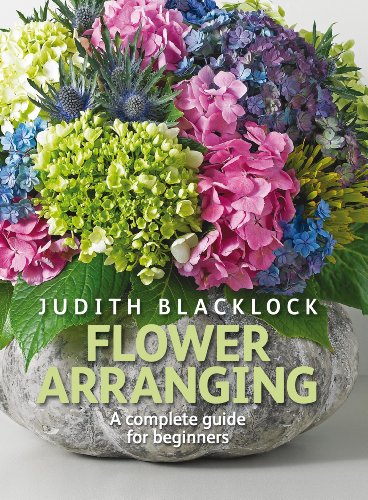 Book cover with a colorful floral arrangement in a stone vase, titled "Flower Arranging".