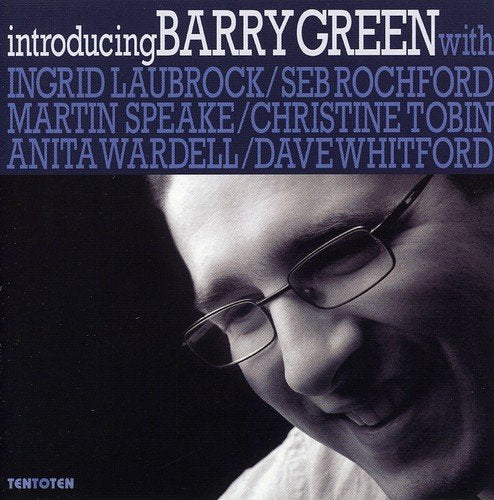 "Album cover with a black-and-white photo of a man wearing glasses."