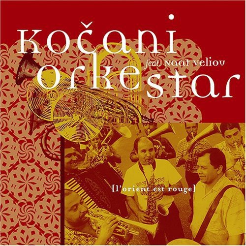 Album cover with red background, white text, and musicians playing instruments in yellow-toned photo.