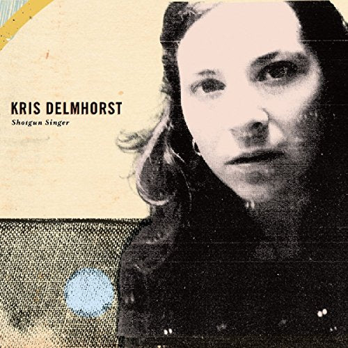 "Album cover with black and white portrait of a woman, Kris Delmhorst, and album title."