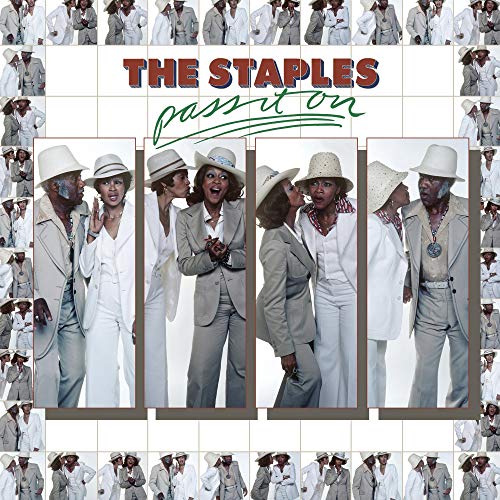 "Album cover featuring The Staples in white suits and hats, with collaged background."